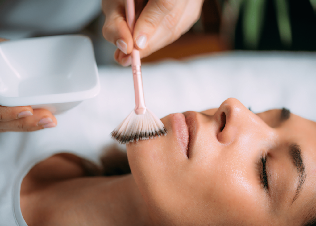 Woman receiving a chemical peel treatment